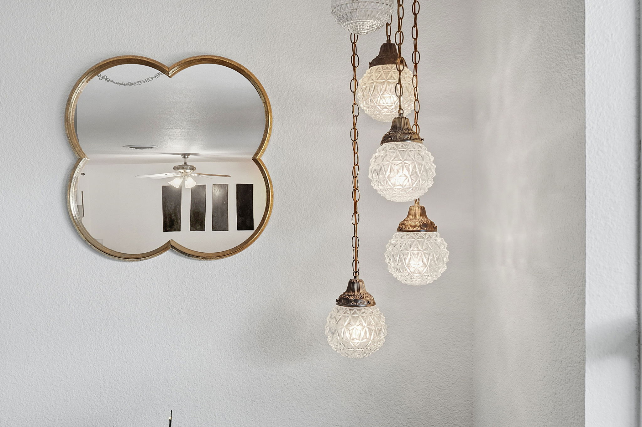 700 Corral Lane Austin, TX 78745 - Photo 10 of 26 a bathroom with a light fixture and a mirror