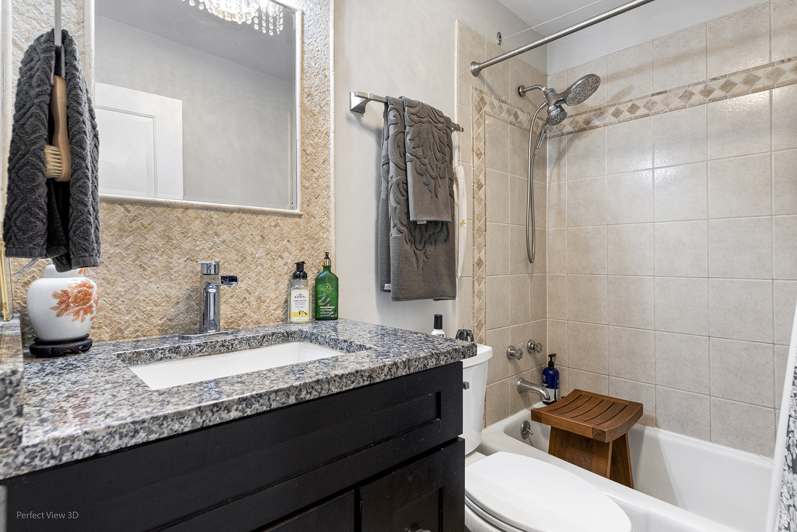 5455 North Sheridan Road, Unit 3105 Chicago, IL 60640 - Photo 18 of 18 a bathroom with a granite countertop sink and a mirror