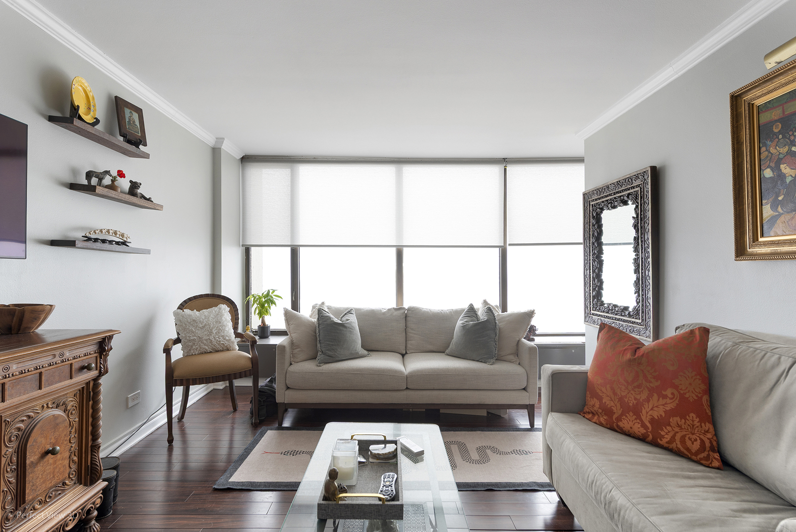 5455 North Sheridan Road, Unit 3105 Chicago, IL 60640 - Photo 4 of 18 a living room with furniture and a window