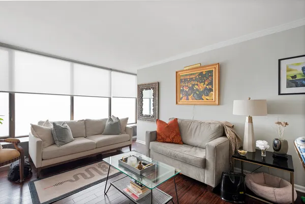 a living room with furniture and a window
