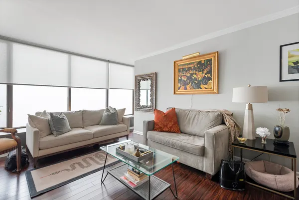 a living room with furniture and a window