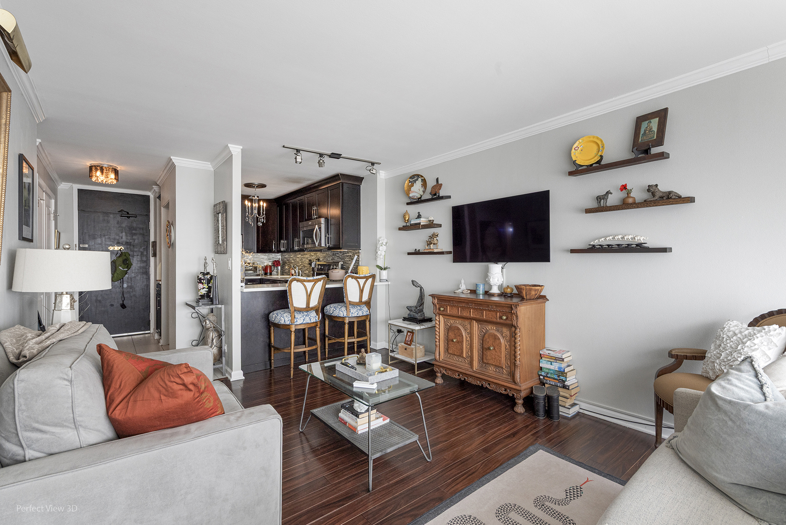 5455 North Sheridan Road, Unit 3105 Chicago, IL 60640 - Photo 7 of 18 a living room with furniture and a flat screen tv