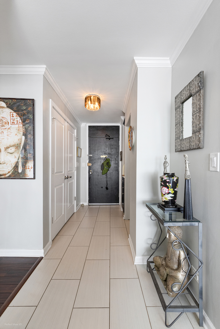 5455 North Sheridan Road, Unit 3105 Chicago, IL 60640 - Photo 10 of 18 a view of livingroom with furniture and cabinet