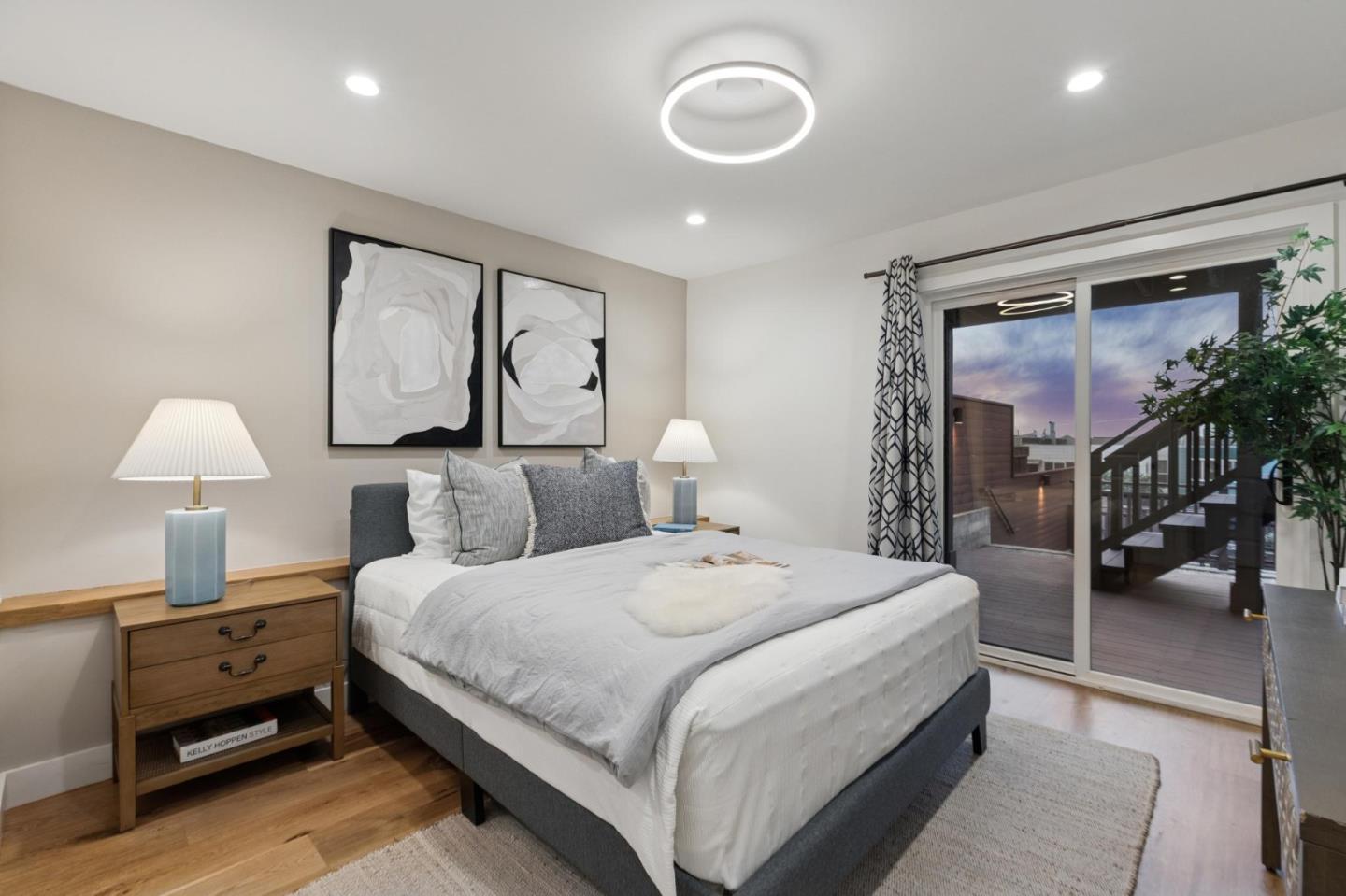 2271 40th Avenue San Francisco, CA 94116 - Photo 92 of 125 a bedroom with a bed and a lamp