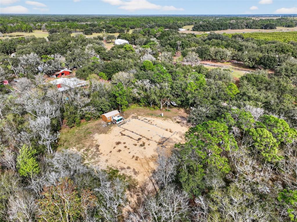 168 Walk In Water Creek Road Lake Wales, FL 33898 - Photo 4 of 15 an aerial view of a houses with a yard