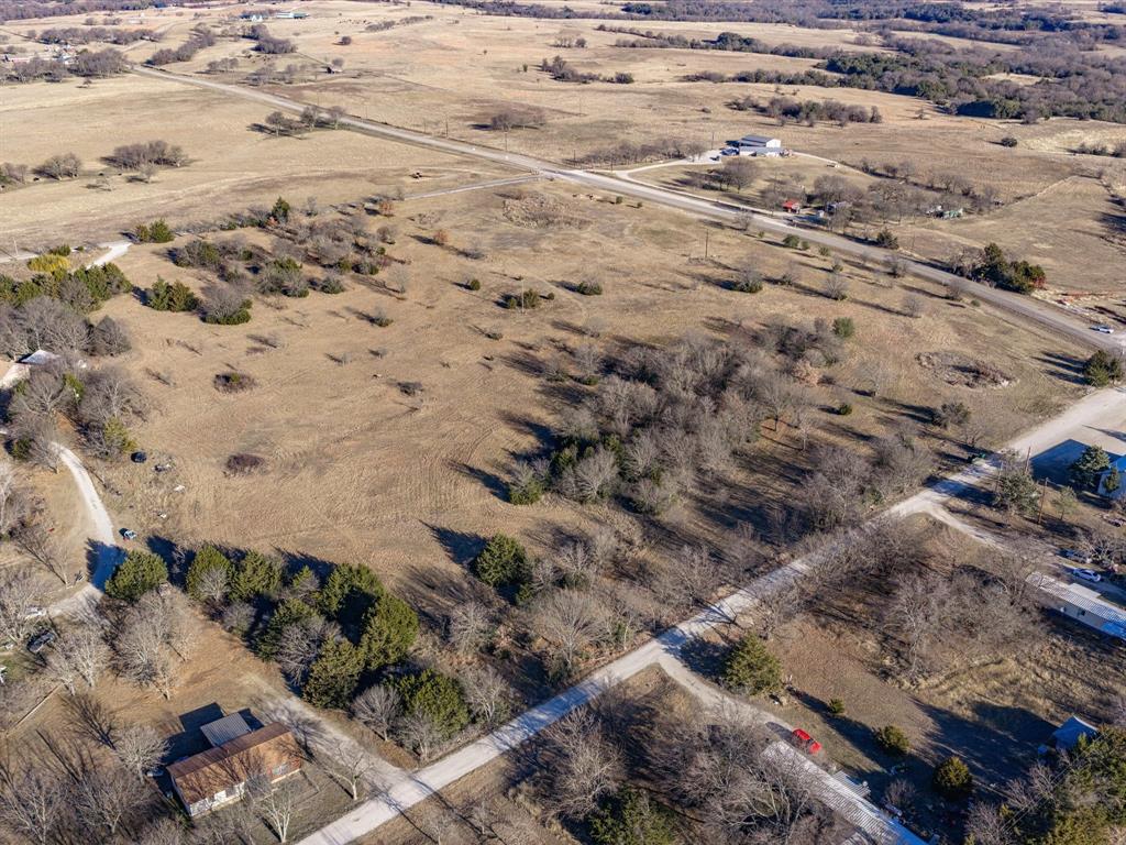 Tbd Tbd Pr-2643 Road, Unit 2643 Decatur, TX 76234 - Photo 6 of 12 a view of a dry yard with lots of trees