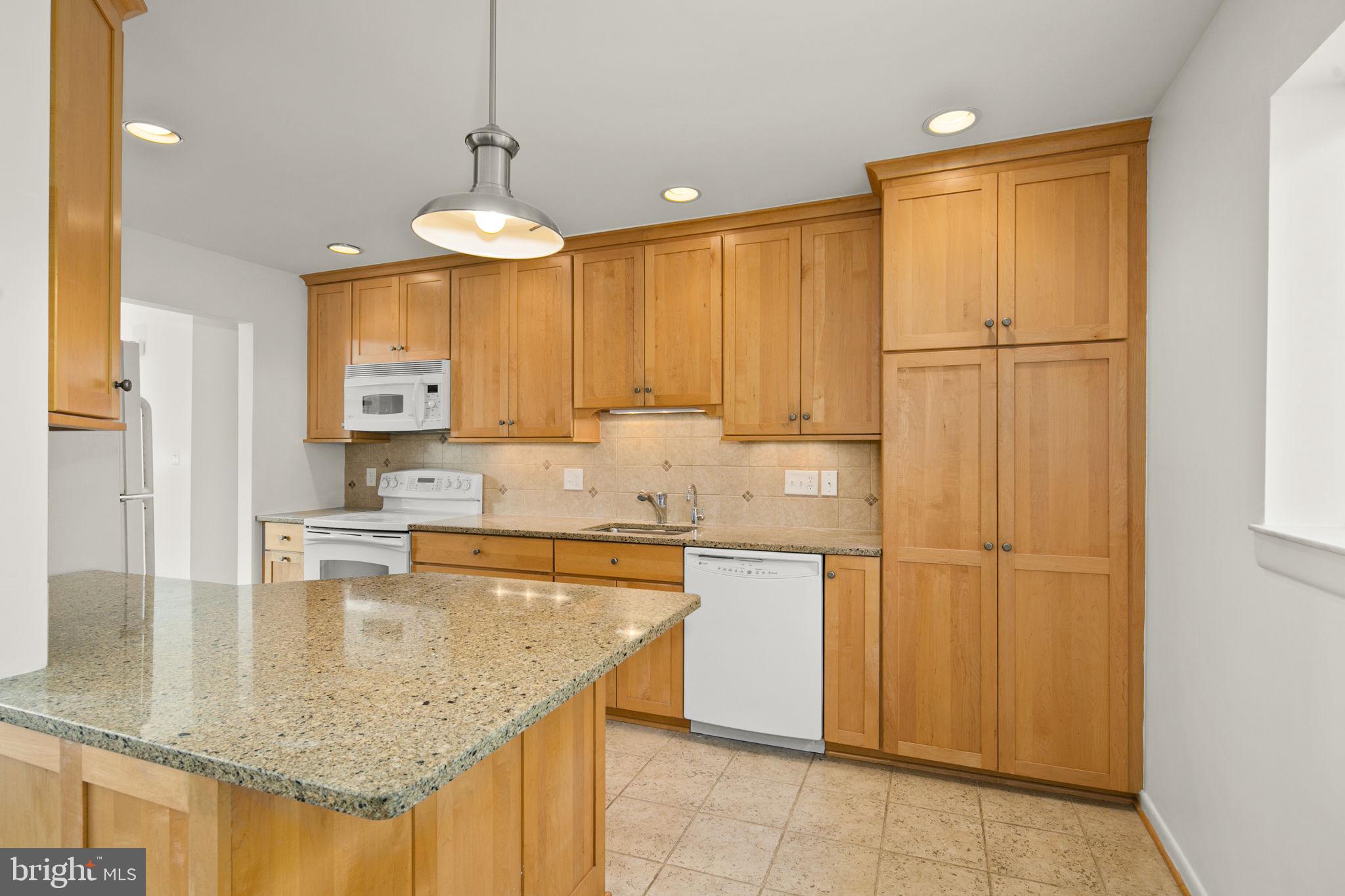 8716 Center Road Springfield, VA 22152 - Photo 14 of 43 Kitchen has tons of cabinet space