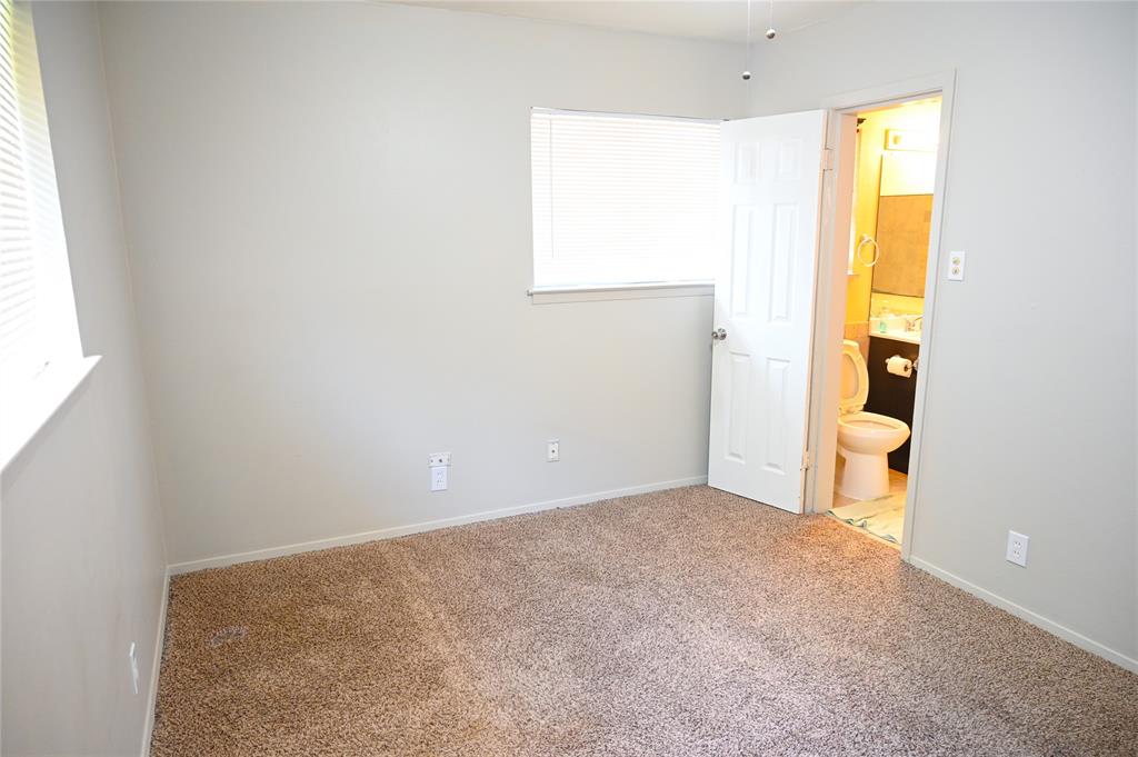 1352 Simpson Drive Hurst, TX 76053 - Photo 29 of 40 Carpeted room with neutral wall paint and white trim