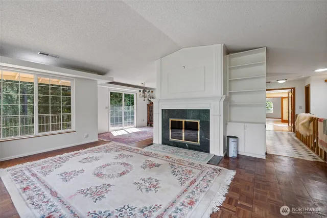 a view of a livingroom with a fireplace