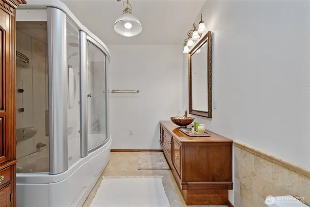 a hallway with front door wooden floor and front door