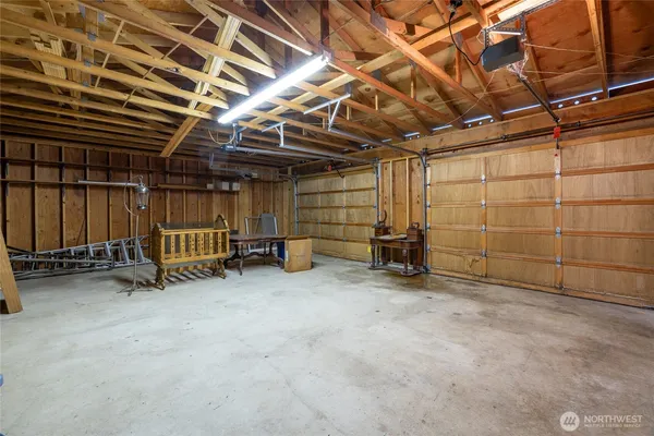 a view of a room with wooden walls