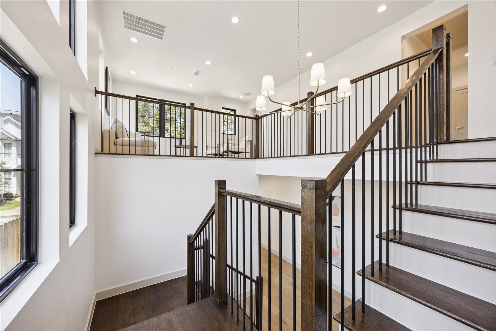 1209 Willard Street Houston, TX 77006 - Photo 16 of 35 a view of entryway with wooden floor and windows