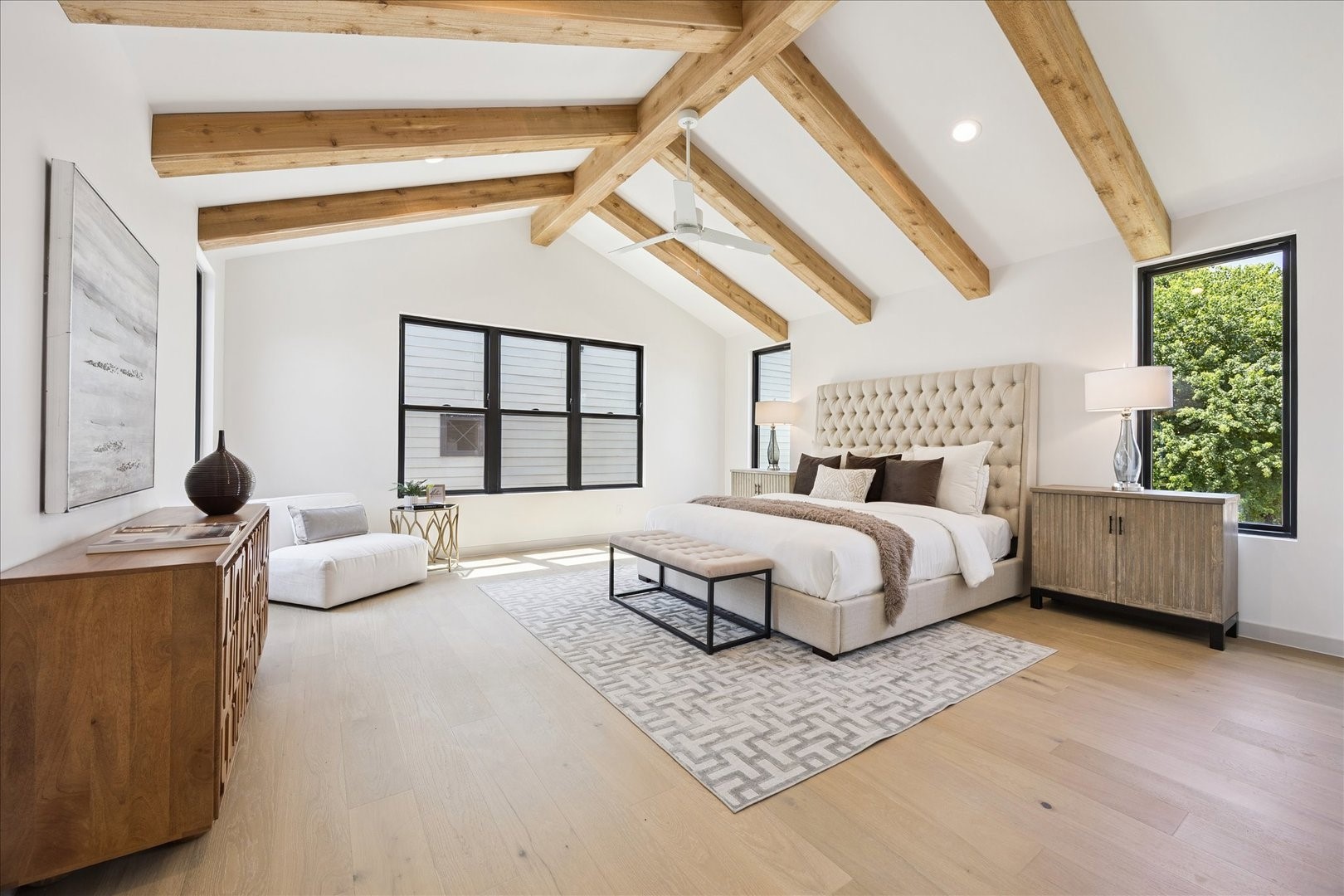 1209 Willard Street Houston, TX 77006 - Photo 19 of 35 a bedroom with a large bed and a large window