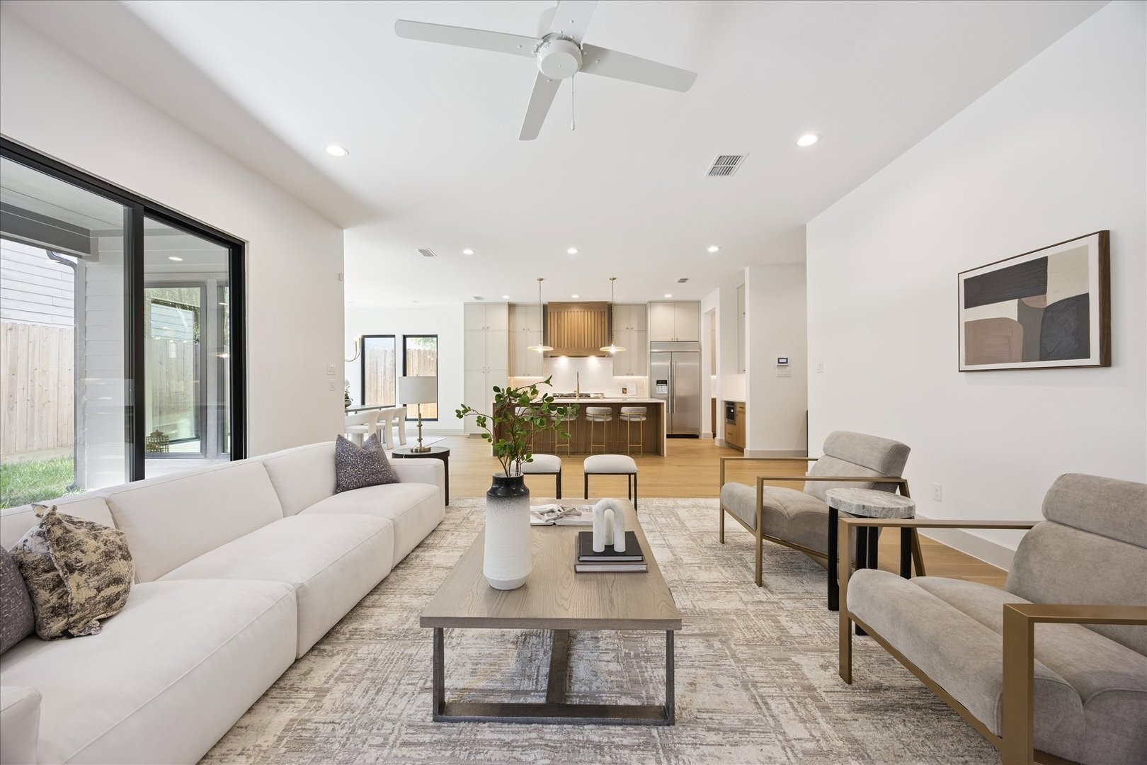 1209 Willard Street Houston, TX 77006 - Photo 2 of 35 a living room with furniture kitchen view and a large window