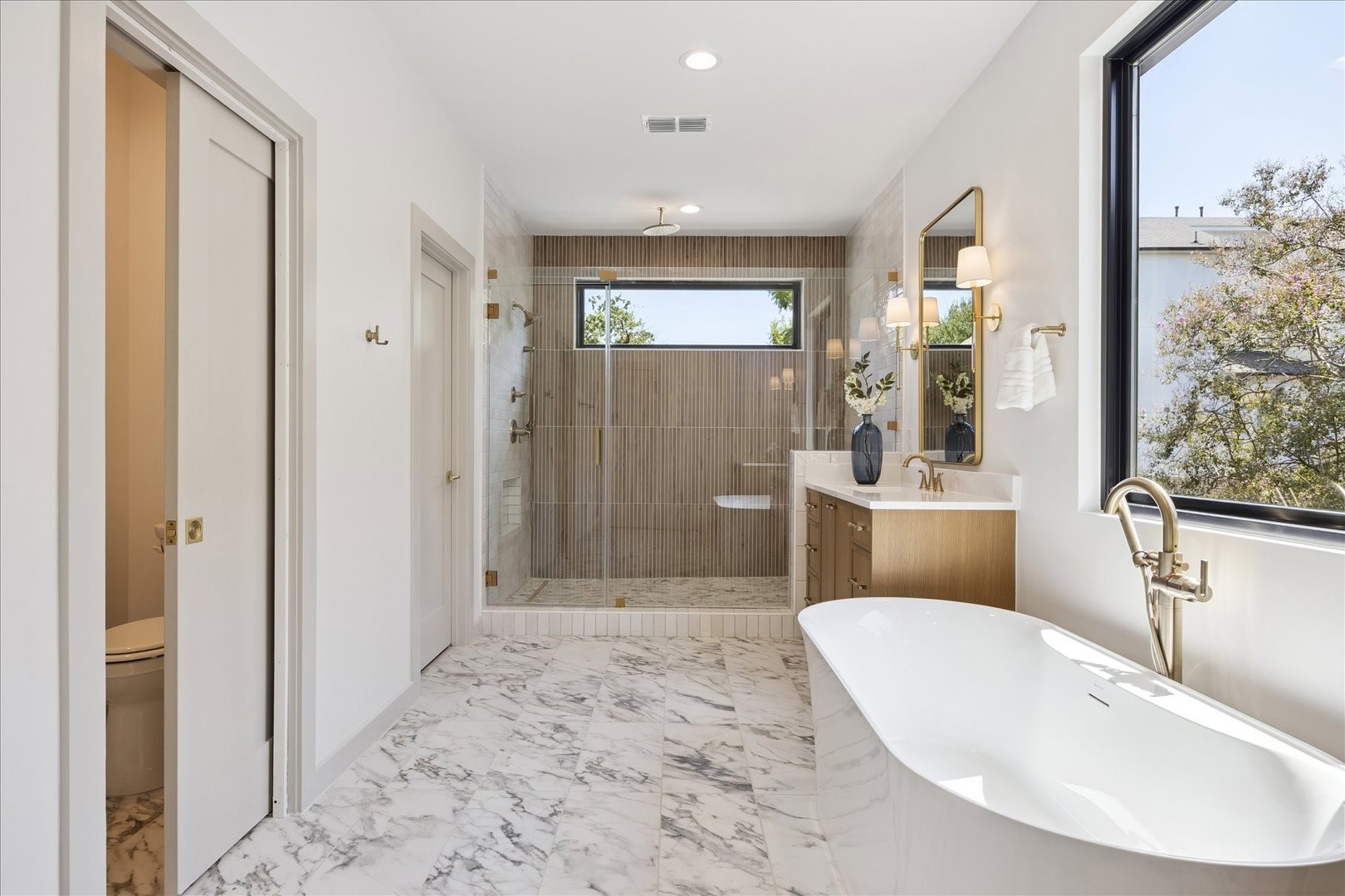 1209 Willard Street Houston, TX 77006 - Photo 21 of 35 a bathroom with a sink a toilet and shower