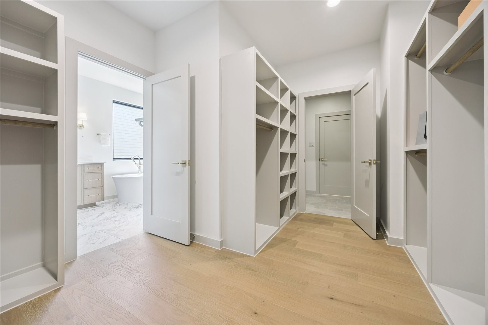 1209 Willard Street Houston, TX 77006 - Photo 24 of 35 a view of a hallway with wooden shelves