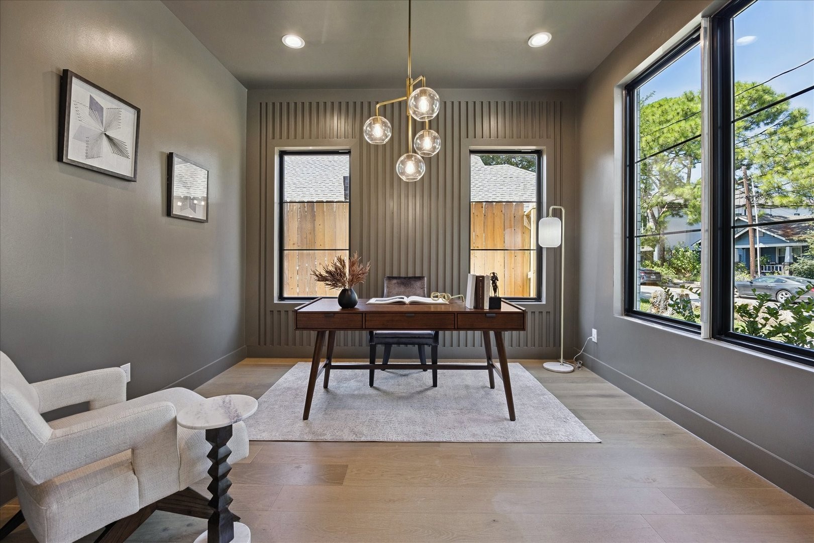 1209 Willard Street Houston, TX 77006 - Photo 4 of 35 a workspace with furniture window and wooden floor