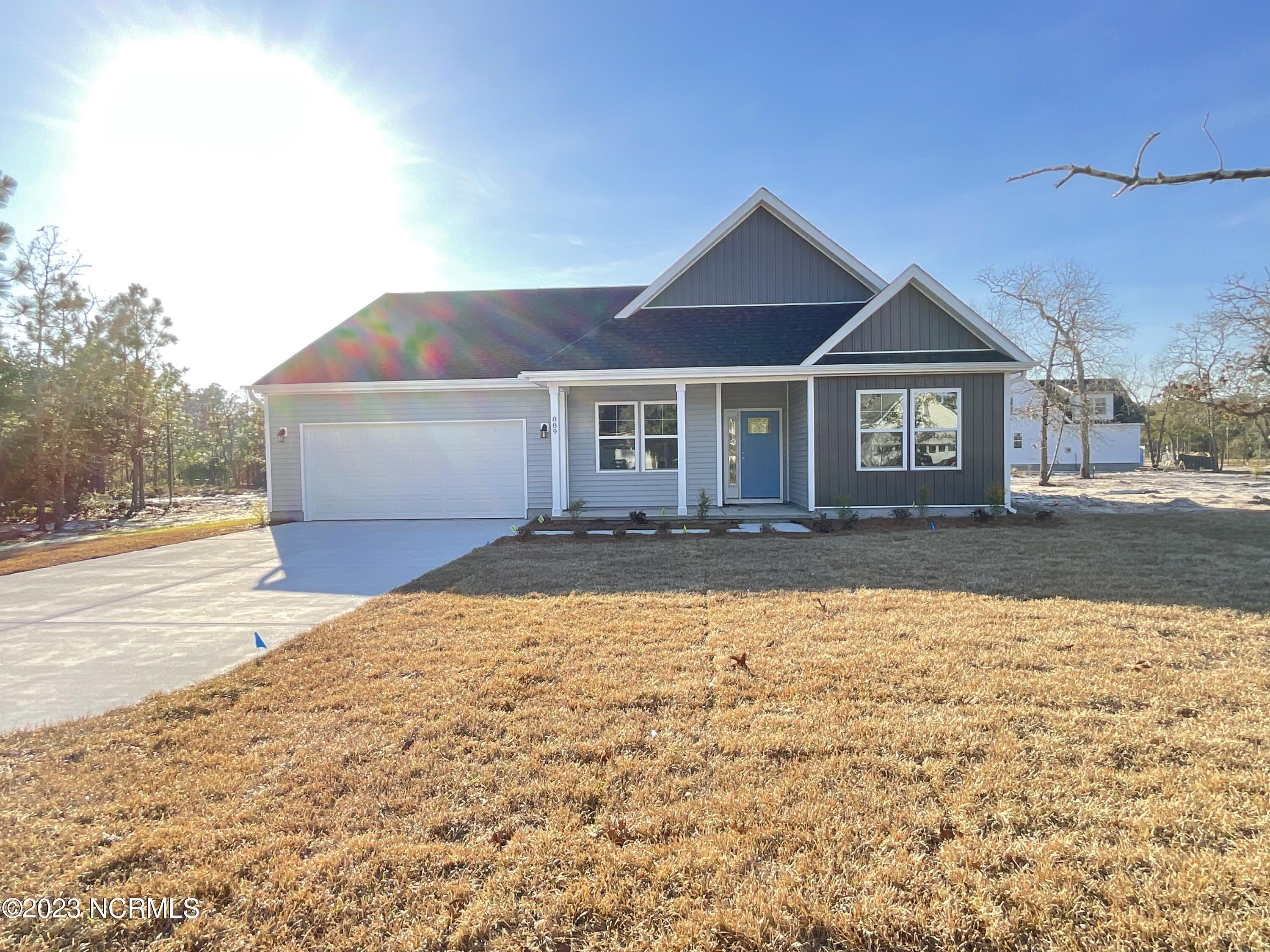 889 Nicklaus Road Boiling Spring Lakes, NC 28461 - Photo 1 of 11 Welcome Home to the Eden PLAN