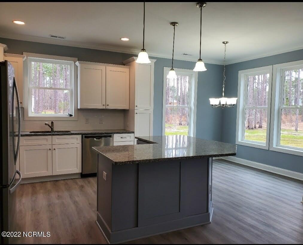 889 Nicklaus Road Boiling Spring Lakes, NC 28461 - Photo 6 of 11 Open Kitchen with Island
