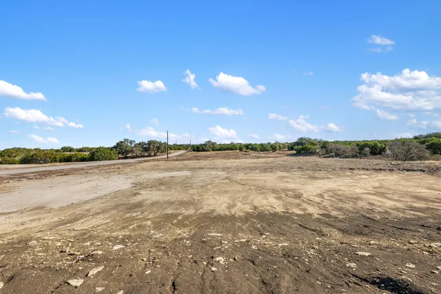 a view of lake with sunset
