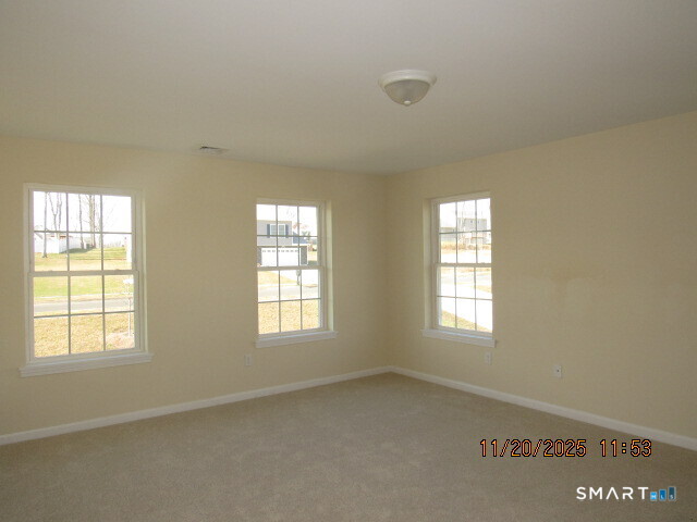 31 Warm Earth Road Naugatuck, CT 06770 - Photo 17 of 31 a view of an empty room with a window