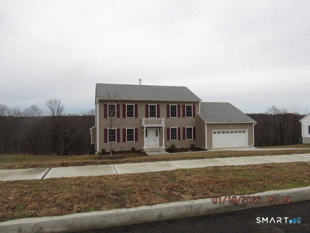 31 Warm Earth Road Naugatuck, CT 06770 - Photo 31 of 31 a front view of a house with a yard