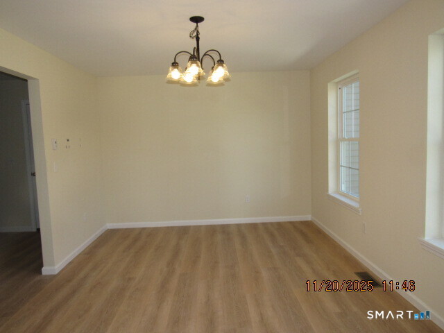 31 Warm Earth Road Naugatuck, CT 06770 - Photo 5 of 31 a view of water heater room with wooden floor