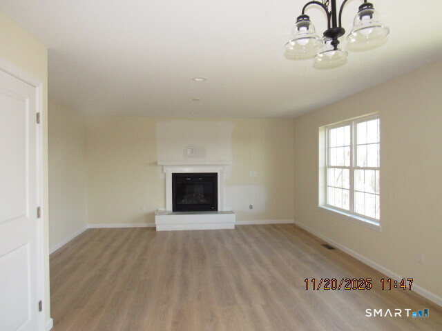 31 Warm Earth Road Naugatuck, CT 06770 - Photo 8 of 31 an empty room with windows