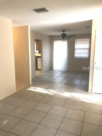 a view of an empty room and window