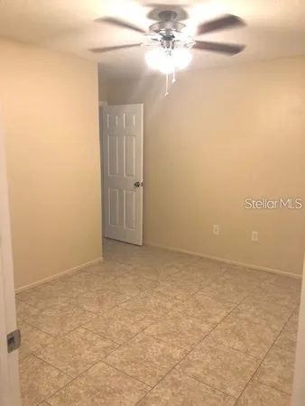 a view of hallway with a large window