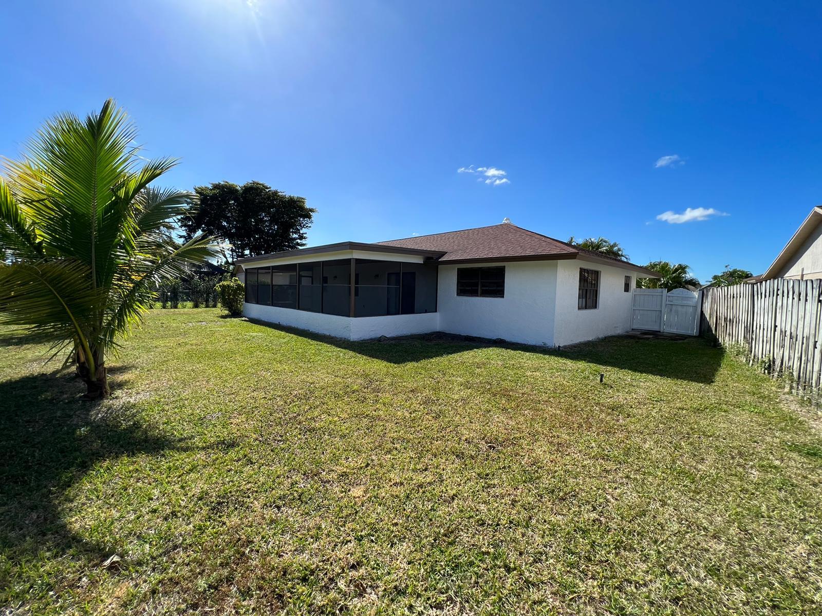 1289 Pinetta Circle Wellington, FL 33414 - Photo 25 of 29 Backyard
