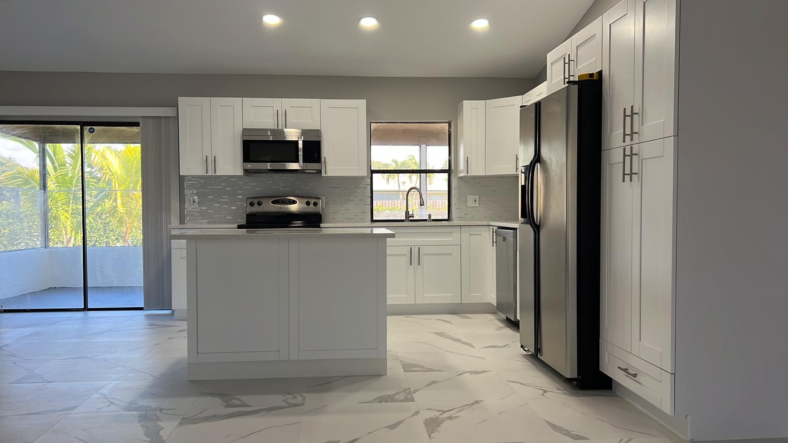 1289 Pinetta Circle Wellington, FL 33414 - Photo 3 of 29 New Kitchen w/Cuartz Counters