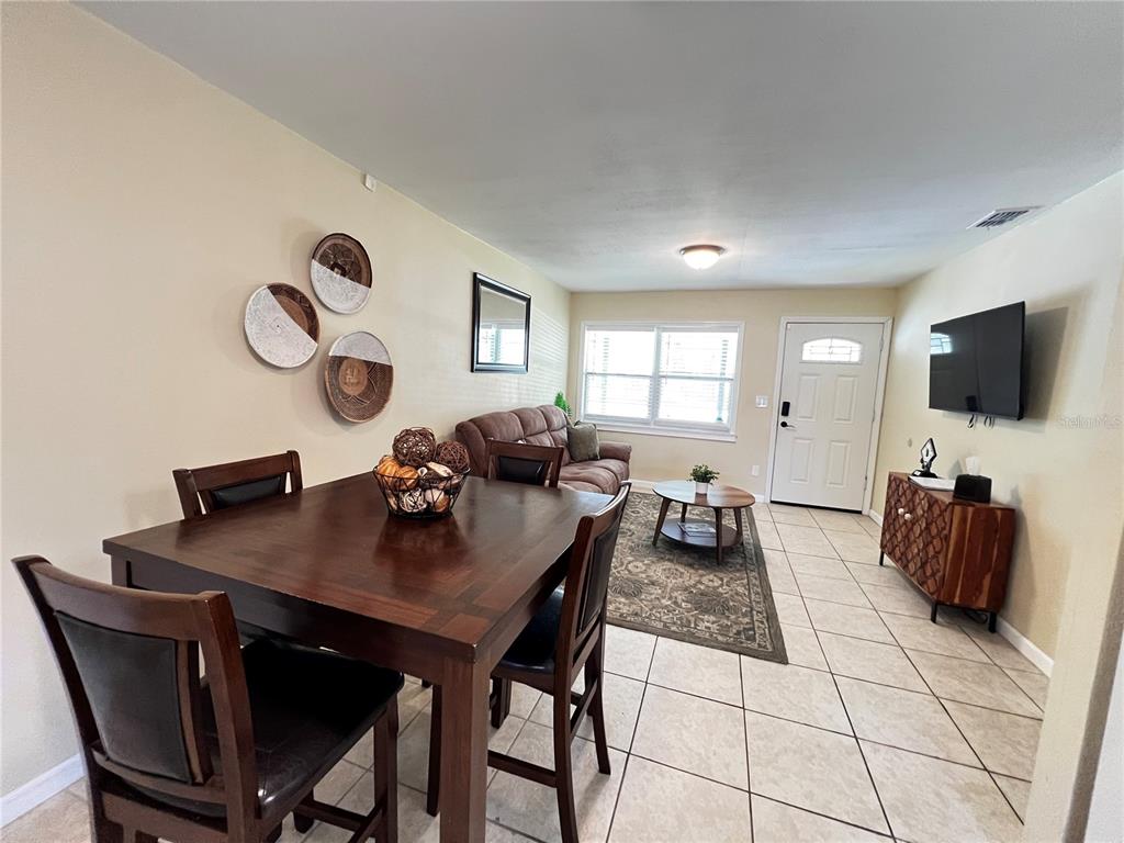 138 Woods Road San Mateo, FL 32187 - Photo 5 of 9 a view of a workspace with furniture
