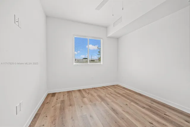 an empty room with a window