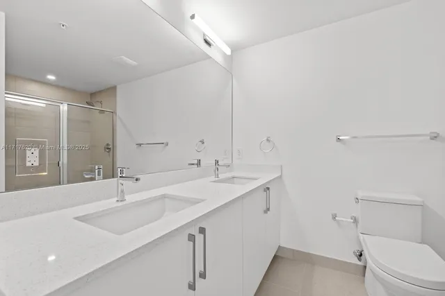 a bathroom with a sink and a toilet
