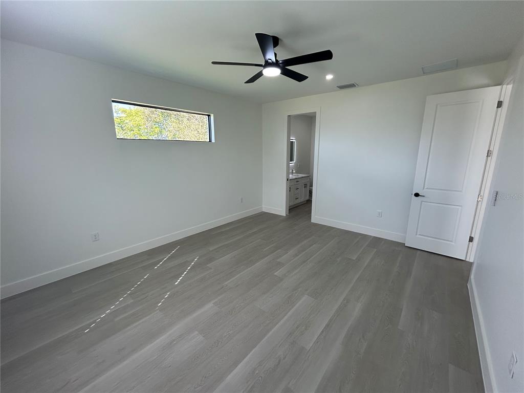 7361 South Plum Tree Punta Gorda, FL 33955 - Photo 9 of 14 a view of an empty room with a window
