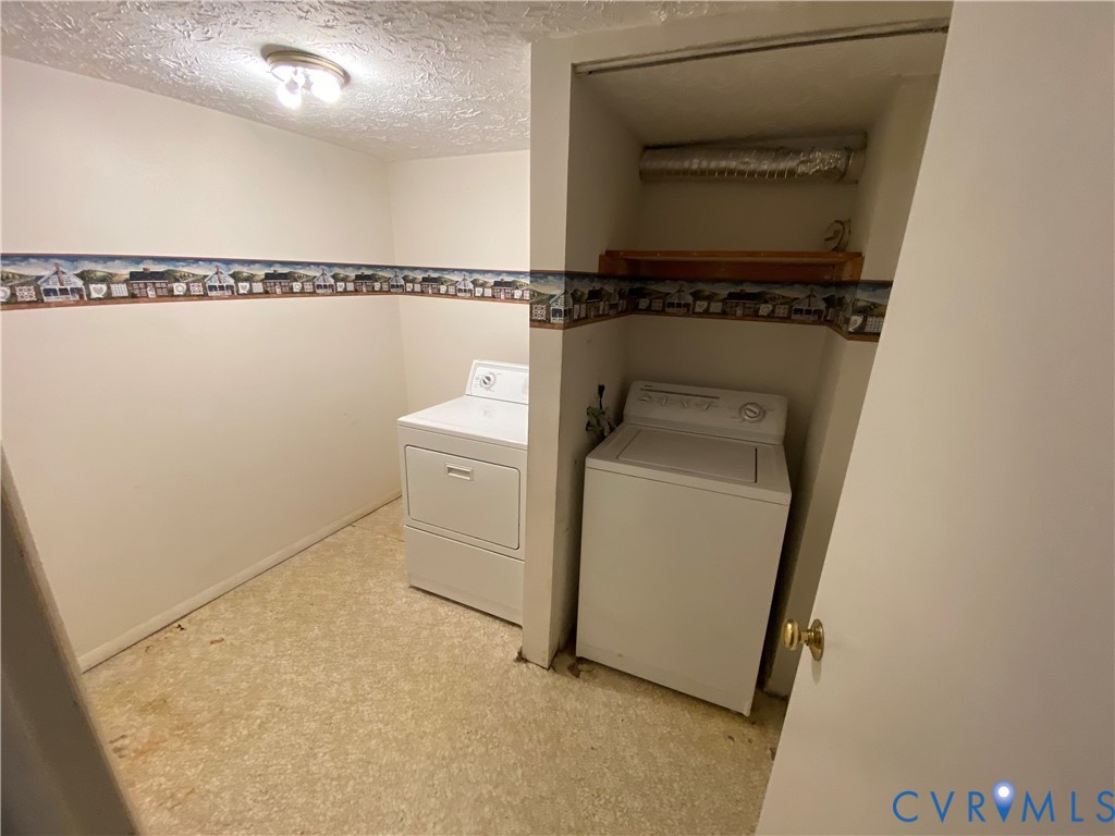 1507 Bronwyn Road, Unit 301 Henrico, VA 23238 - Photo 21 of 41 a utility room with dryer and washer