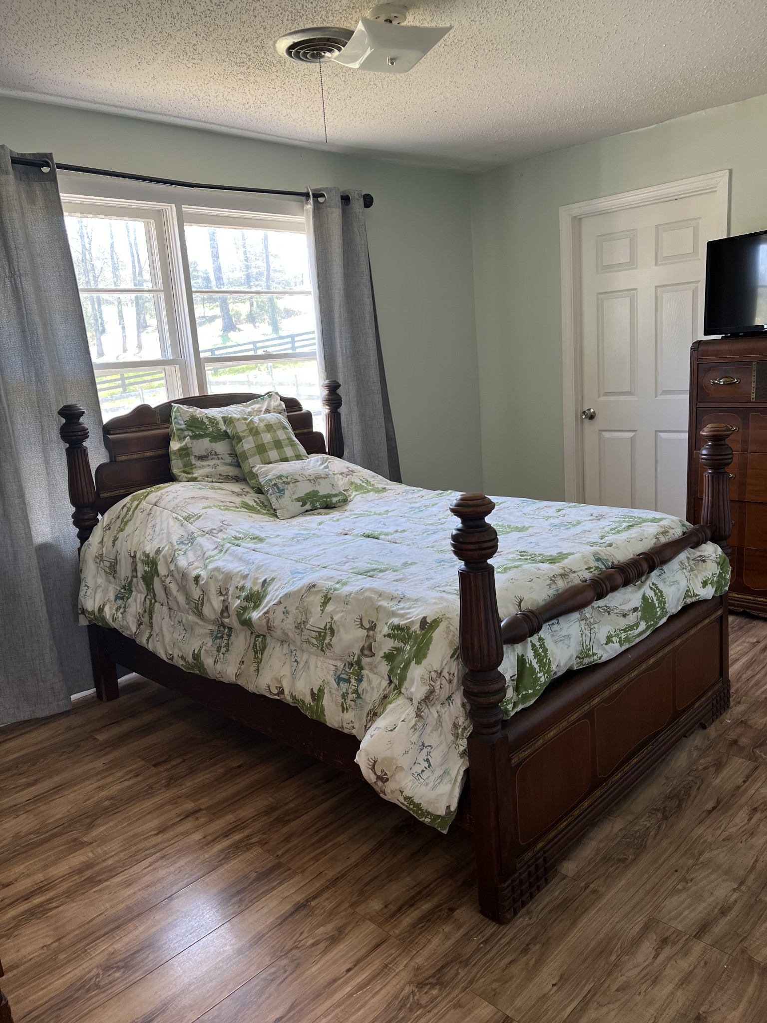 2206 Hagan Road Prospect, TN 38477 - Photo 8 of 30 a bedroom with bed and wooden floor