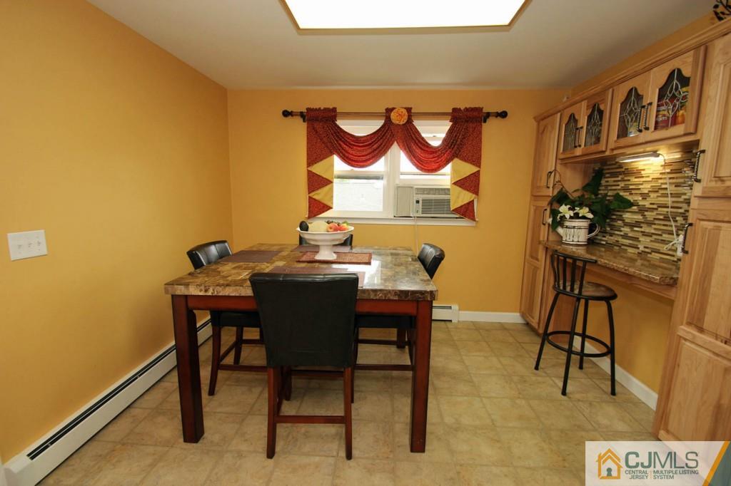 67 Brandywine Road Fords, NJ 08863 - Photo 14 of 25 a view of a tables and chairs in a room