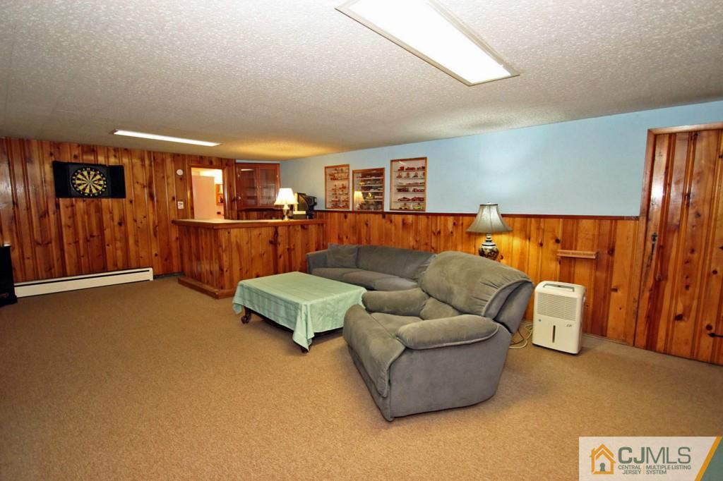 67 Brandywine Road Fords, NJ 08863 - Photo 17 of 25 a living room with furniture and a window