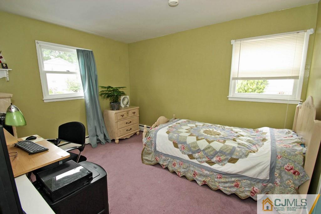 67 Brandywine Road Fords, NJ 08863 - Photo 20 of 25 a bedroom with bed and a window