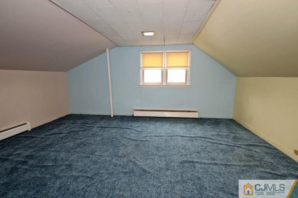 67 Brandywine Road Fords, NJ 08863 - Photo 22 of 25 an empty room with a window