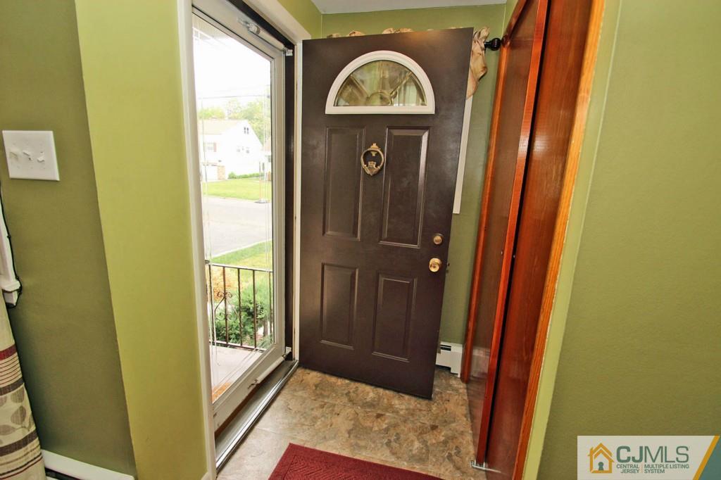 67 Brandywine Road Fords, NJ 08863 - Photo 4 of 25 a view of front door door with wooden door