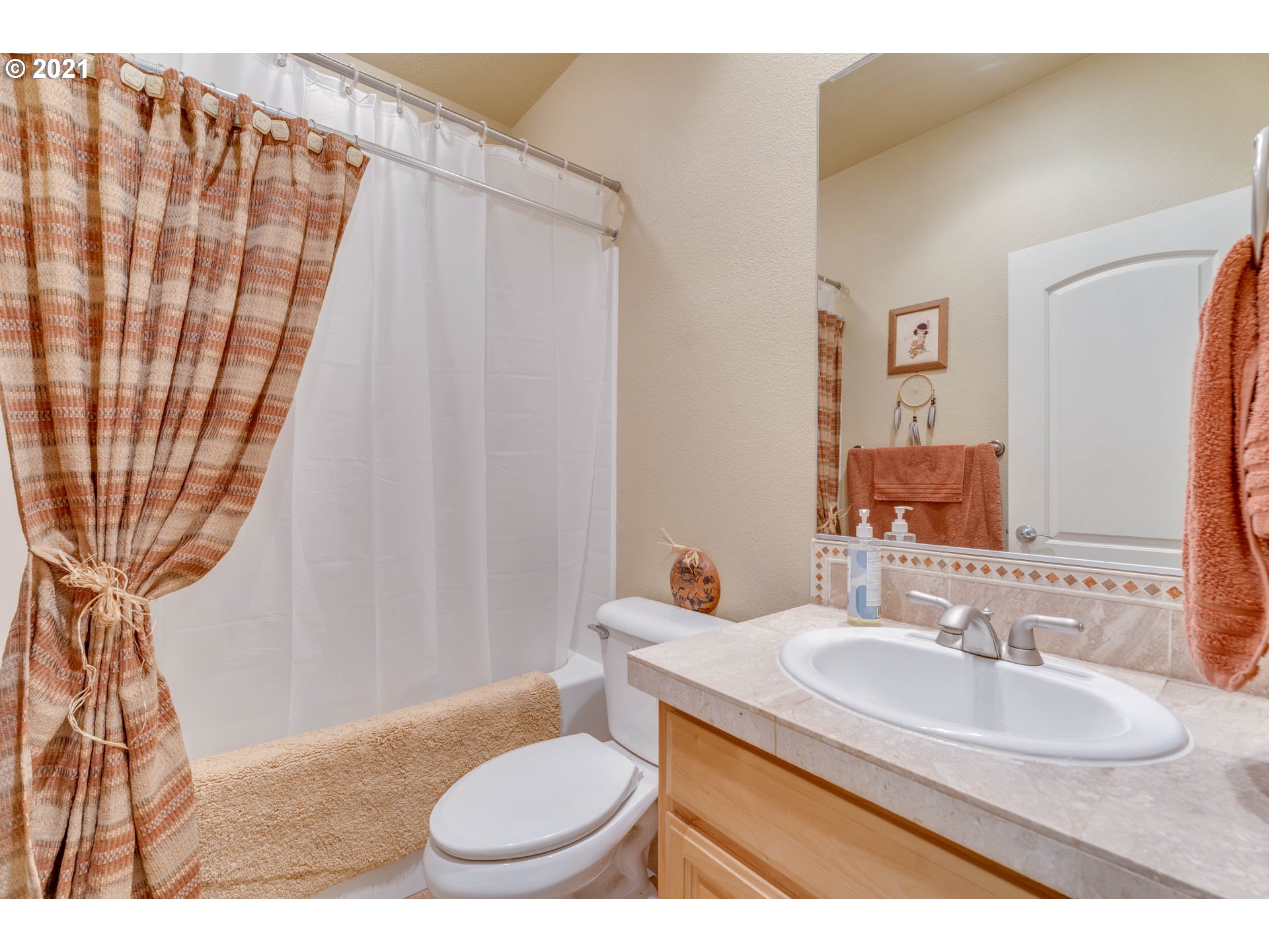 43126 Southeast Music Camp Road Sandy, OR 97055 - Photo 16 of 32 a bathroom with a sink toilet and a mirror
