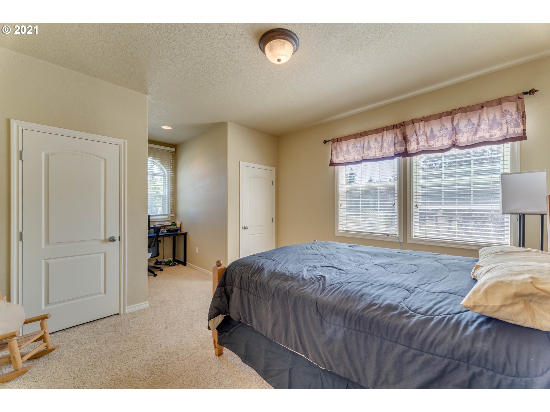 43126 Southeast Music Camp Road Sandy, OR 97055 - Photo 18 of 32 a bedroom with a bed and a large window