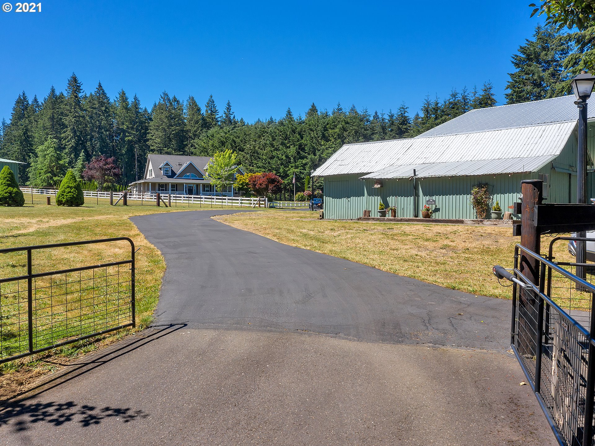 43126 Southeast Music Camp Road Sandy, OR 97055 - Photo 2 of 32 a view of a swimming pool with a patio