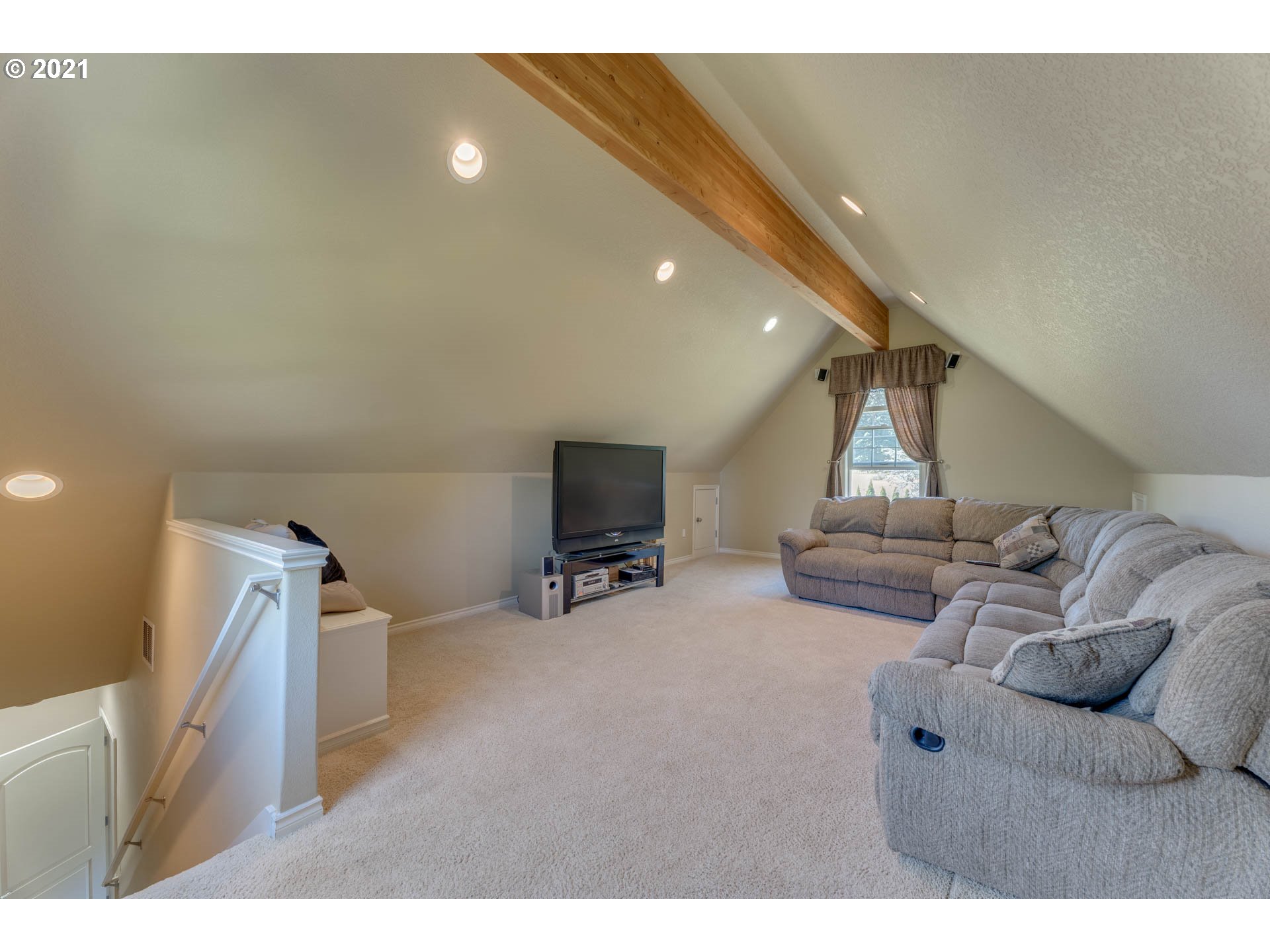 43126 Southeast Music Camp Road Sandy, OR 97055 - Photo 21 of 32 a living room with furniture and a flat screen tv