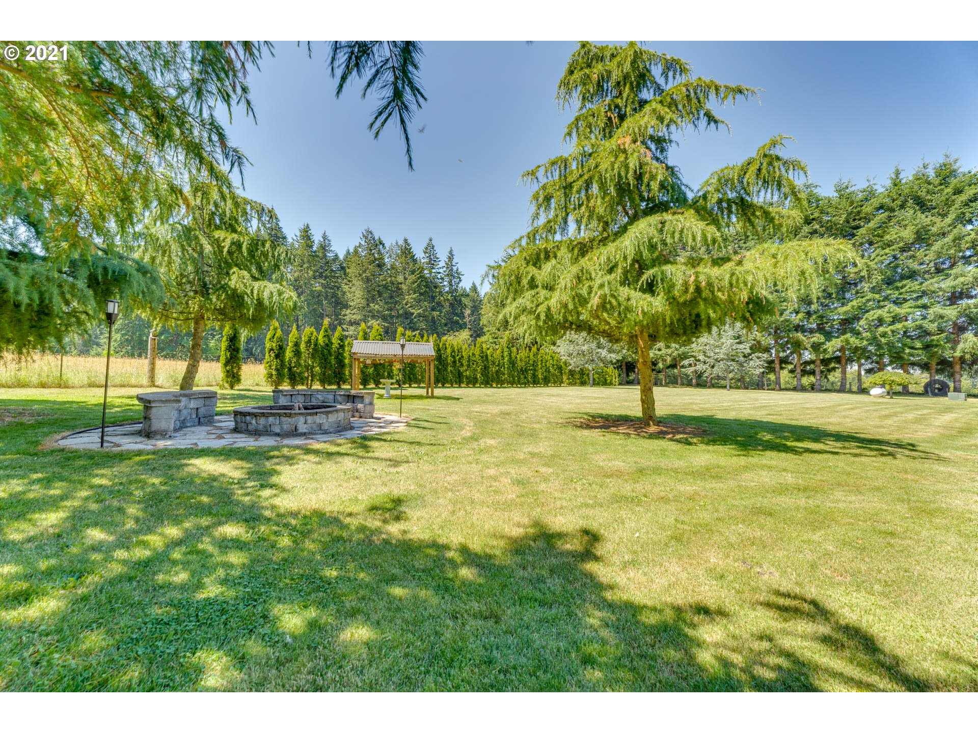 43126 Southeast Music Camp Road Sandy, OR 97055 - Photo 25 of 32 a view of swimming pool with a yard