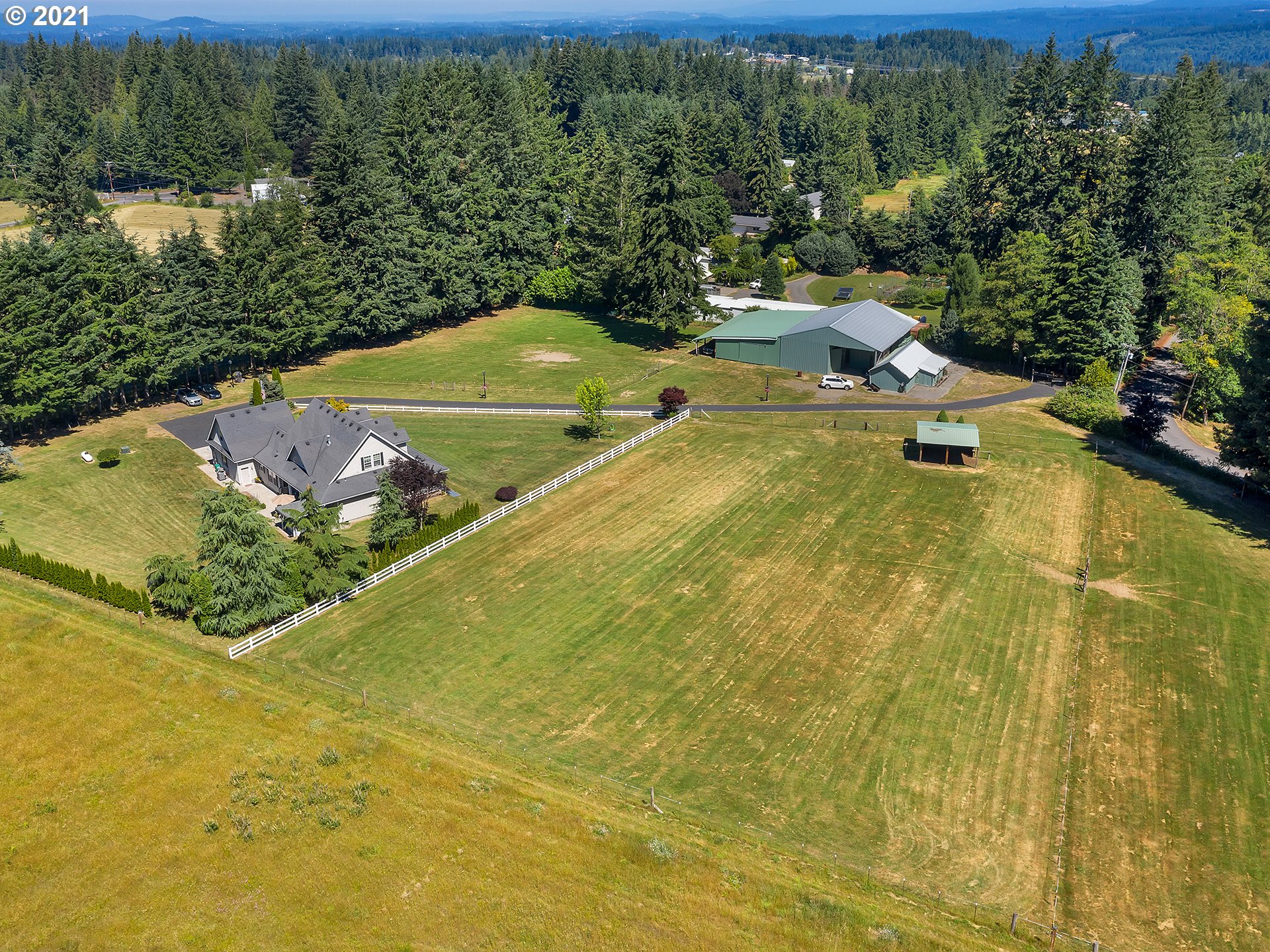 43126 Southeast Music Camp Road Sandy, OR 97055 - Photo 26 of 32 a view of a swimming pool with an outdoor seating and yard