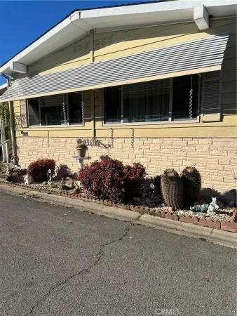 a view of a building with a parking space